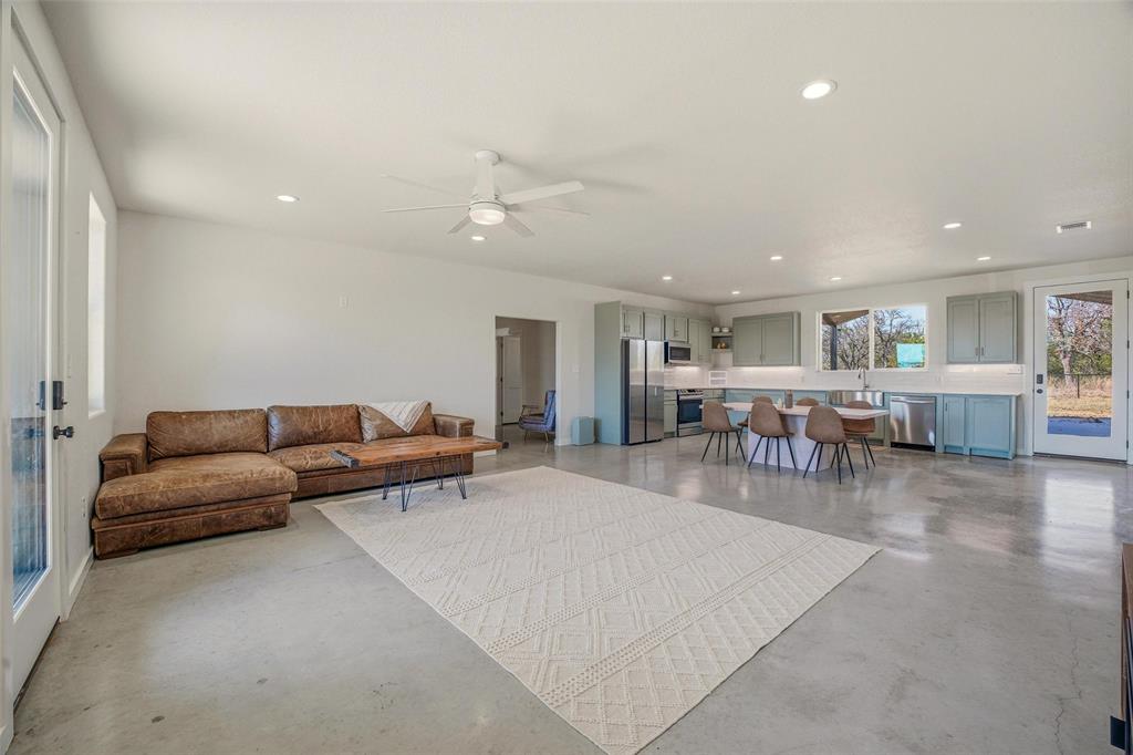 1525 North Bosley Road Santo, TX 76472 - Photo 7 of 40 a living room with furniture and a table