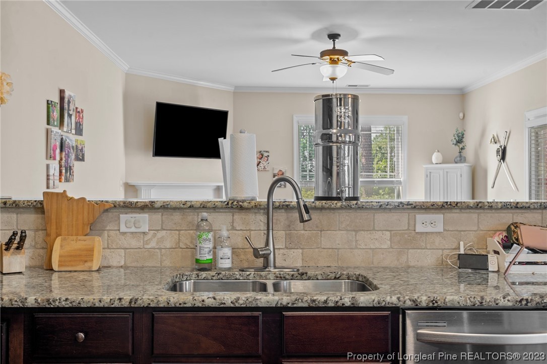 1365 Micahs Way North Spring Lake, NC 28390 - Photo 12 of 36 a bathroom with sink and mirror