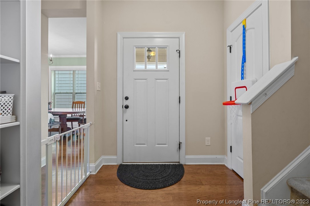 1365 Micahs Way North Spring Lake, NC 28390 - Photo 17 of 36 a view of entryway with wooden floor