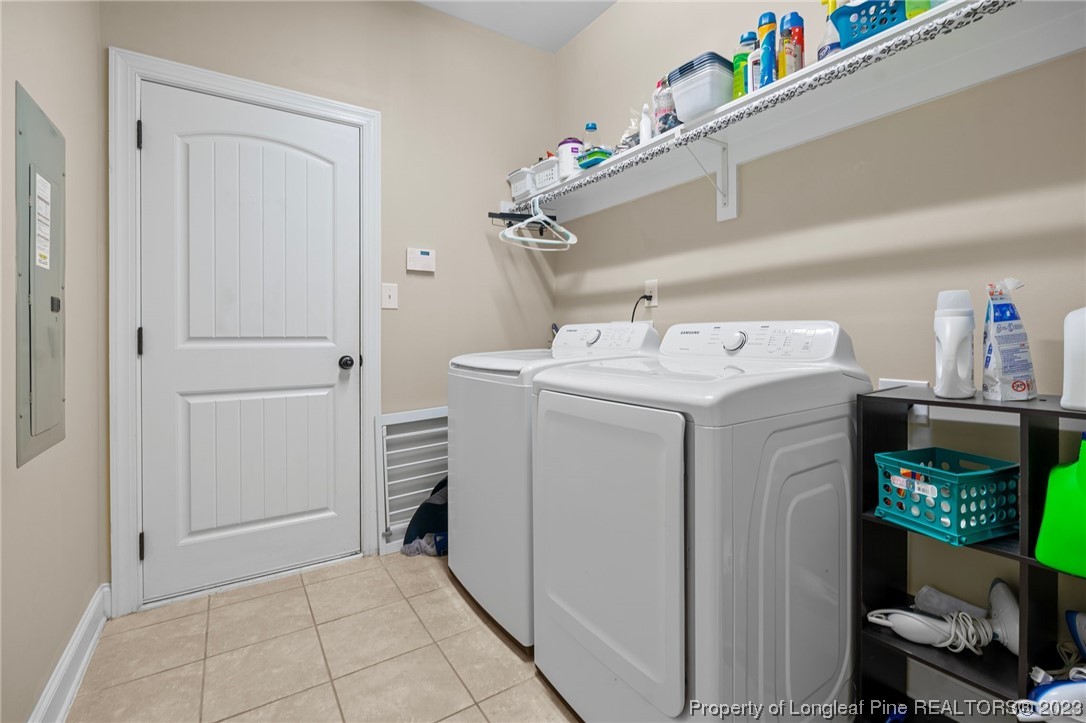 1365 Micahs Way North Spring Lake, NC 28390 - Photo 18 of 36 a utility room with dryer and washer