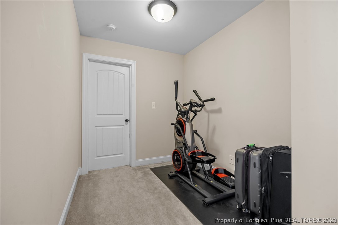 1365 Micahs Way North Spring Lake, NC 28390 - Photo 30 of 36 a view of a room with gym equipment