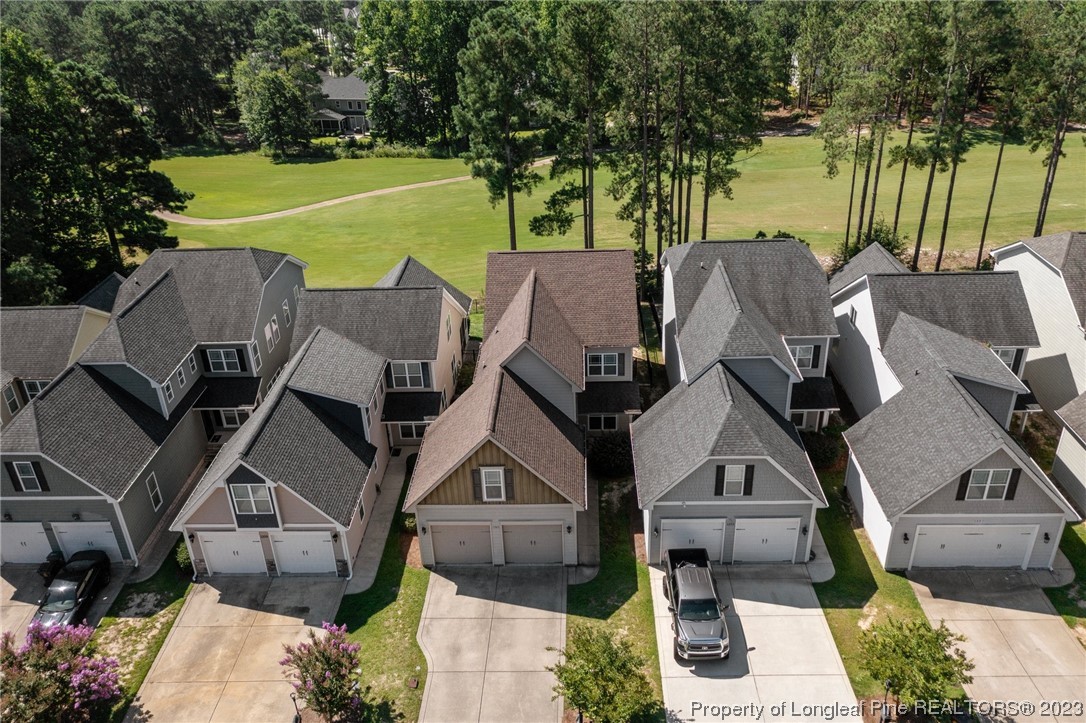 1365 Micahs Way North Spring Lake, NC 28390 - Photo 3 of 36 an aerial view of a house with a big yard