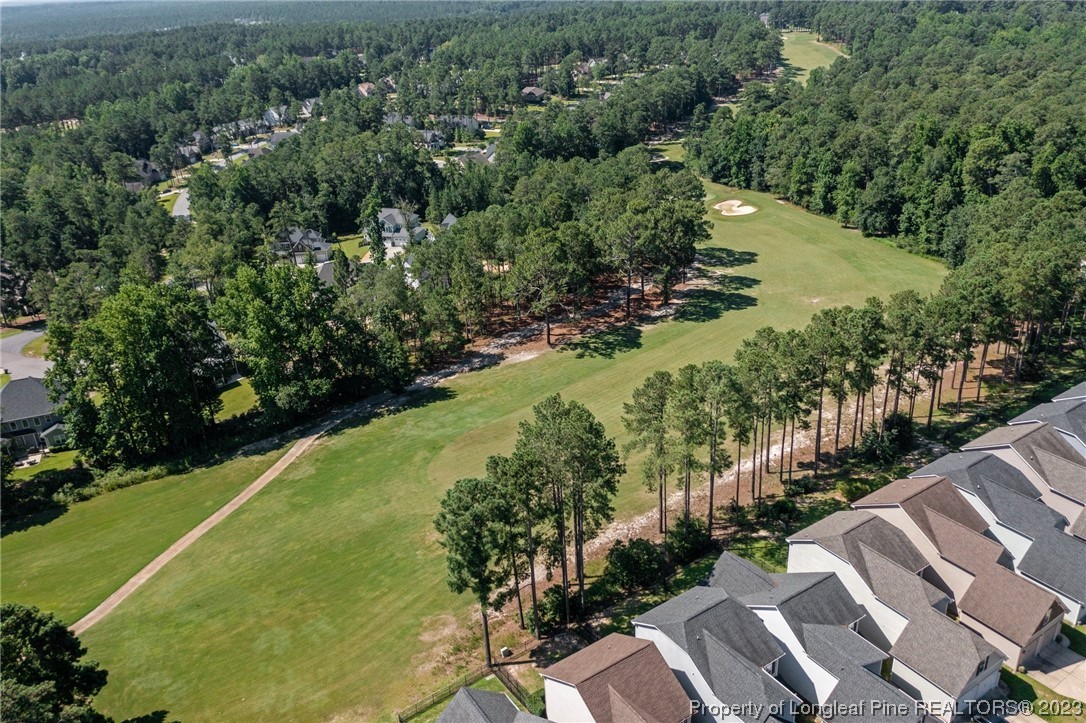 1365 Micahs Way North Spring Lake, NC 28390 - Photo 5 of 36 a view of a lake with a yard