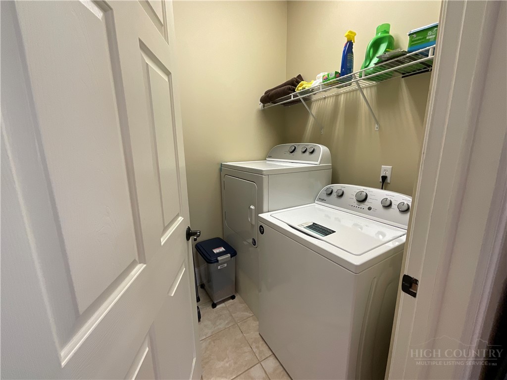140 Gateway Drive, Unit 302 Boone, NC 28607 - Photo 15 of 30 a utility room with dryer and washer