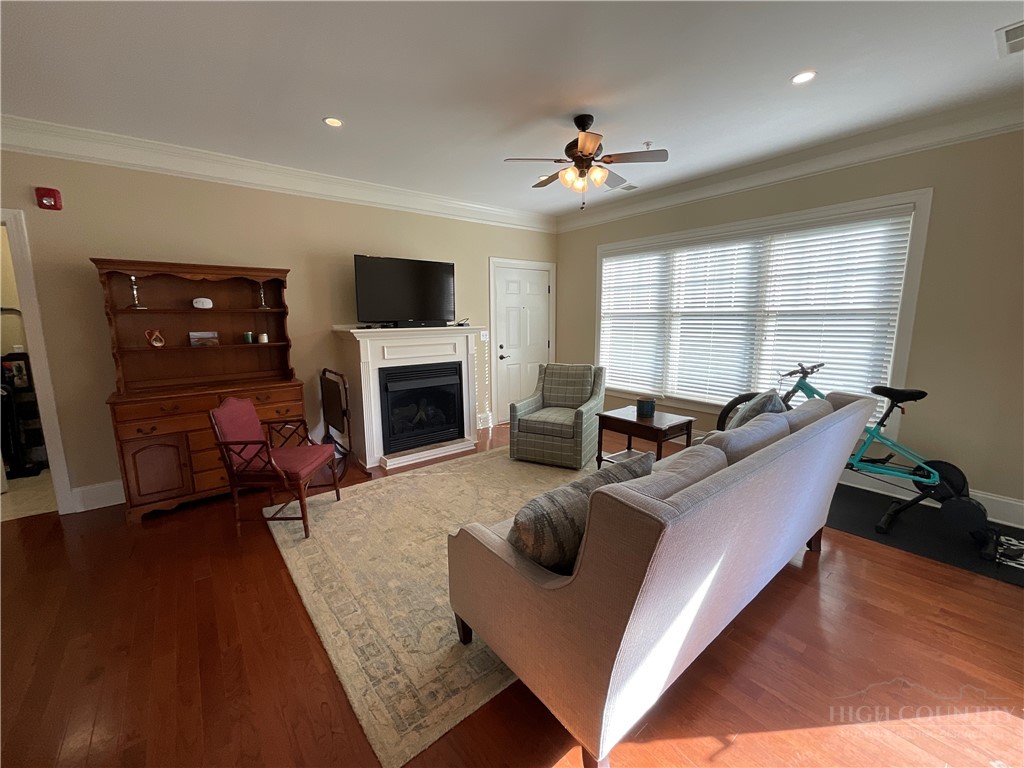 140 Gateway Drive, Unit 302 Boone, NC 28607 - Photo 17 of 30 a living room with furniture fireplace and flat screen tv