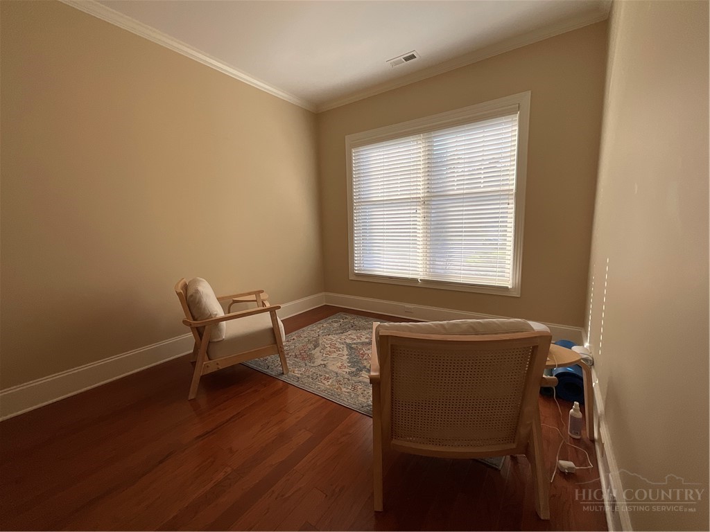 140 Gateway Drive, Unit 302 Boone, NC 28607 - Photo 20 of 30 a reading room with wooden floor and a window