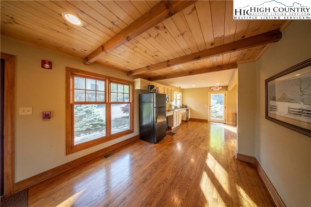 140 Gateway Drive, Unit 302 Boone, NC 28607 - Photo 27 of 30 a view of empty room with wooden floor