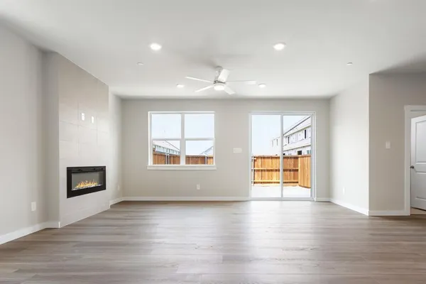 a picture of a wall with a painting on the wall and a white kitchen view