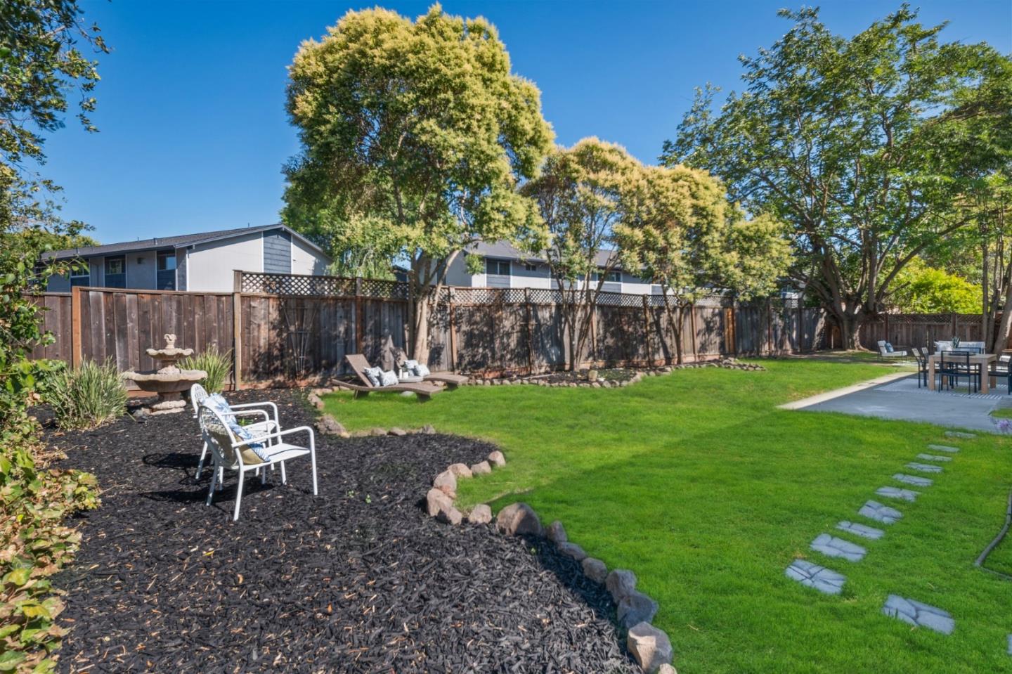 7453 Interlachen Avenue San Ramon, CA 94583 - Photo 23 of 35 a view of a chair and table in backyard of the house