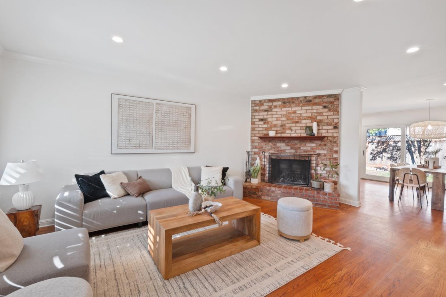 7453 Interlachen Avenue San Ramon, CA 94583 - Photo 4 of 35 a living room with furniture and a fireplace