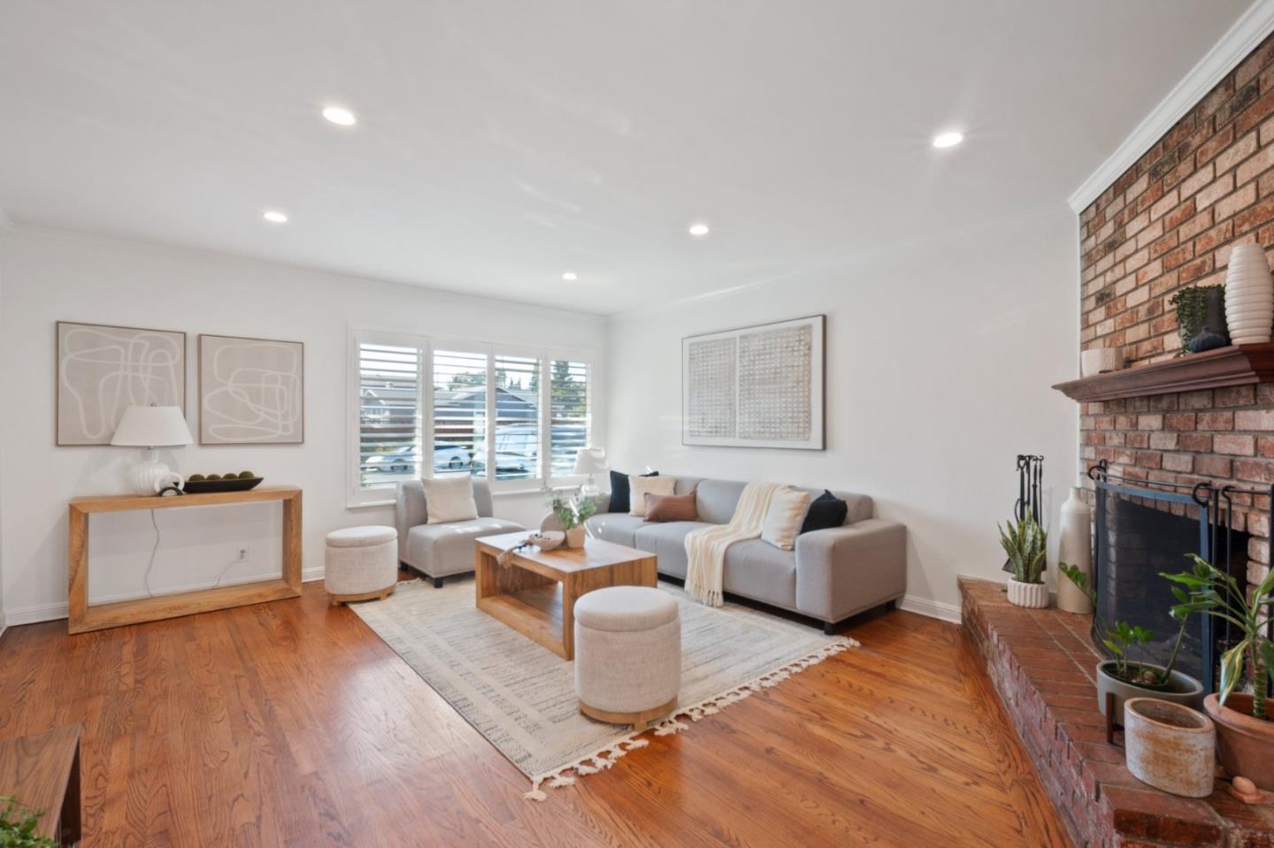7453 Interlachen Avenue San Ramon, CA 94583 - Photo 6 of 35 a living room with fireplace furniture and a wooden floor