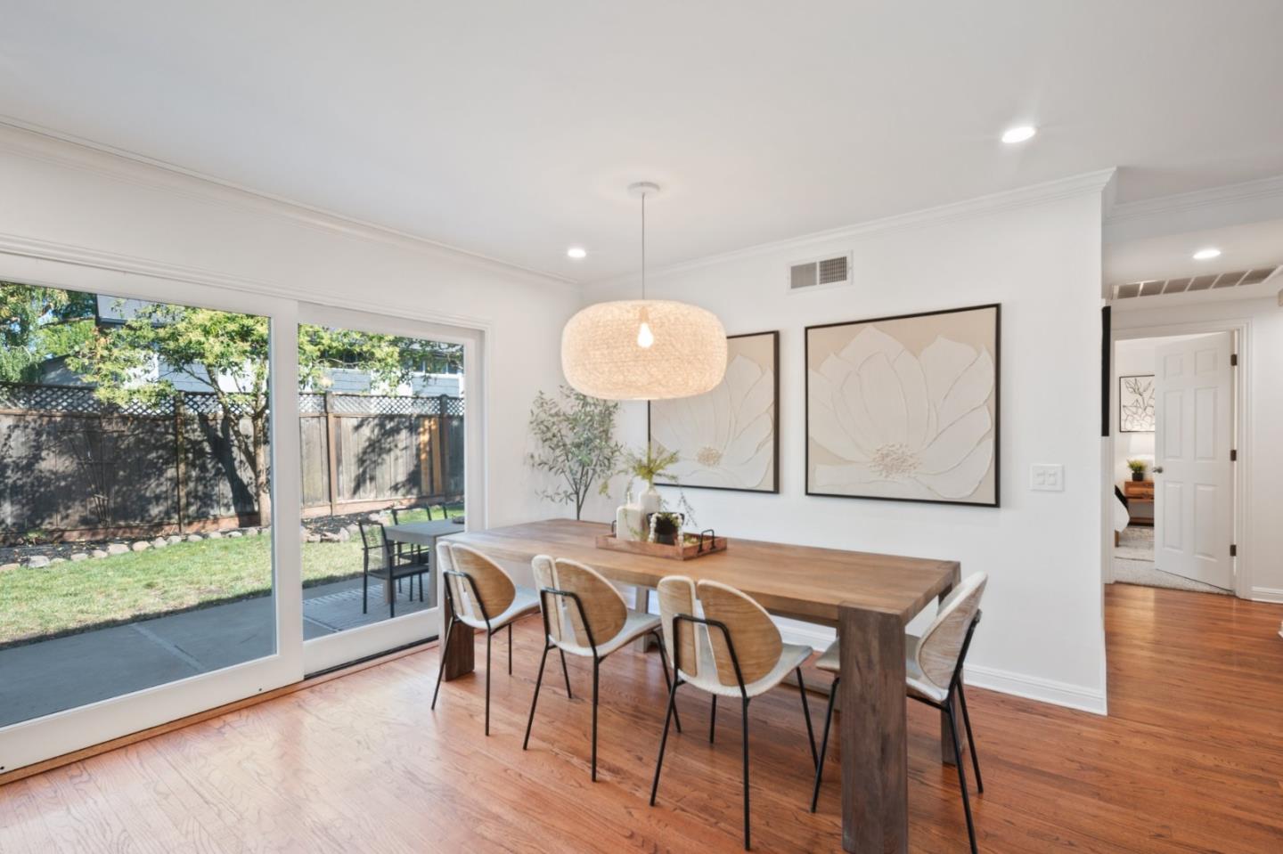 7453 Interlachen Avenue San Ramon, CA 94583 - Photo 7 of 35 a dining room with furniture and wooden floor