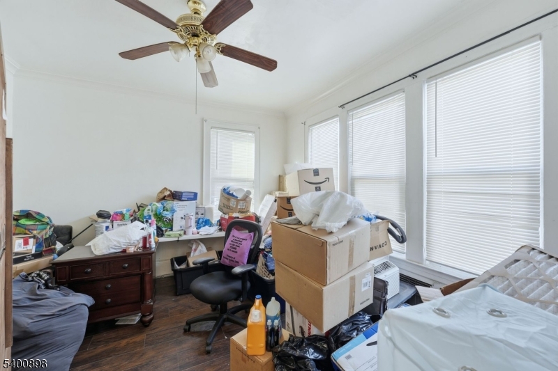 78 South Devine Street Newark, NJ 07106 - Photo 22 of 24 a bed room with furniture and a window
