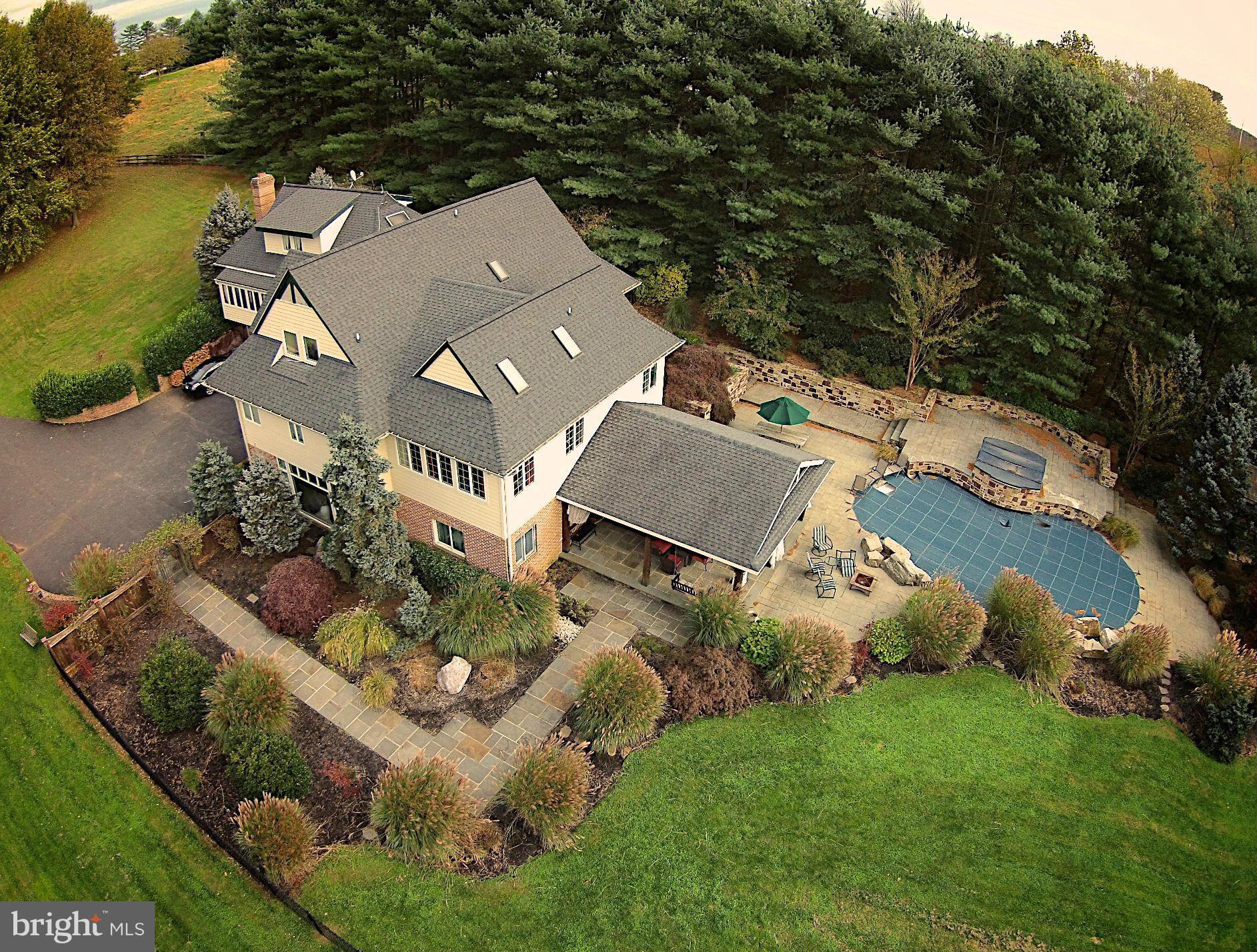 2223 Corbett Road Monkton, MD 21111 - Photo 2 of 30 an aerial view of a house with a garden