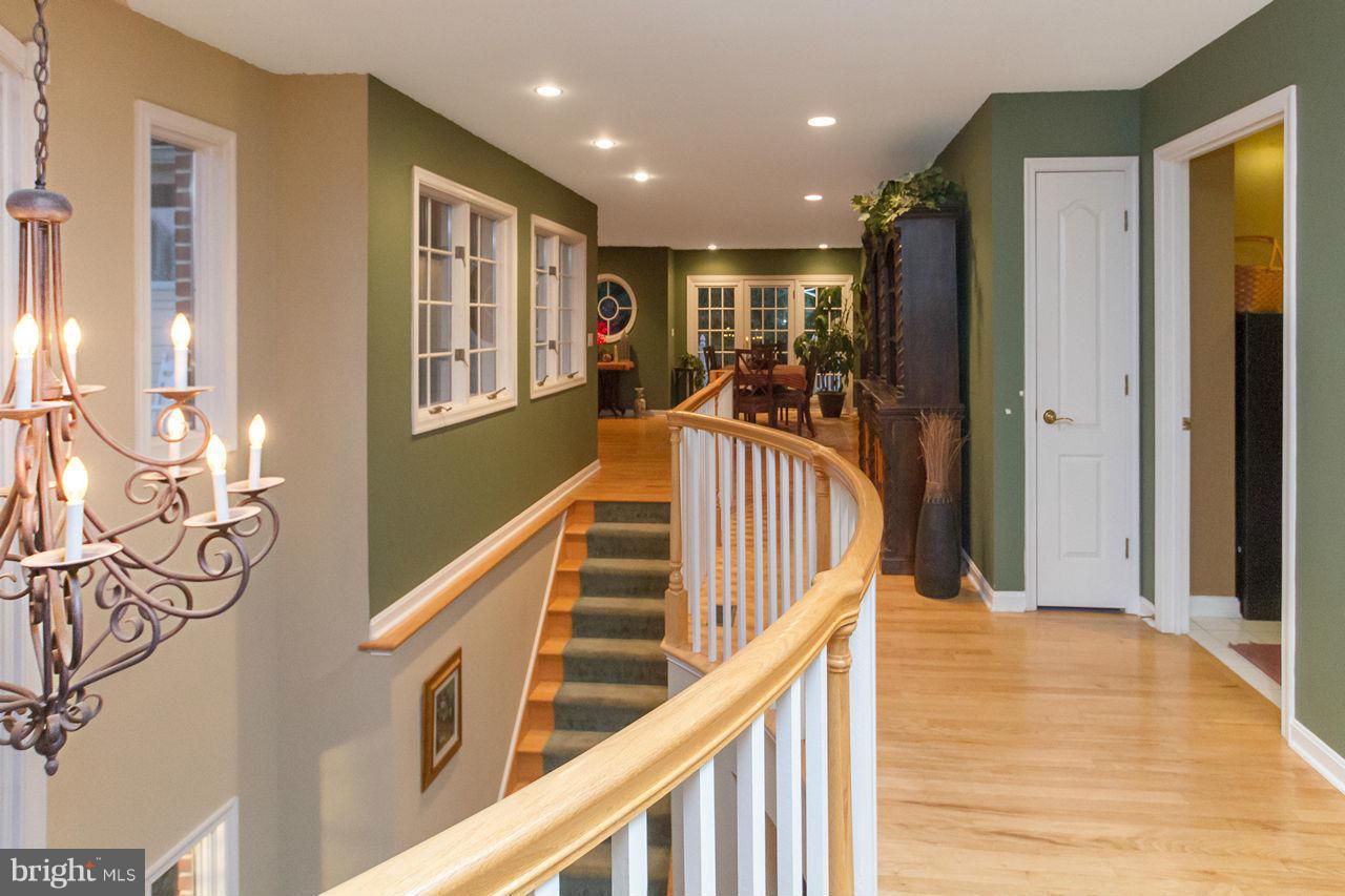 2223 Corbett Road Monkton, MD 21111 - Photo 11 of 30 a view of entryway and hall with wooden floor
