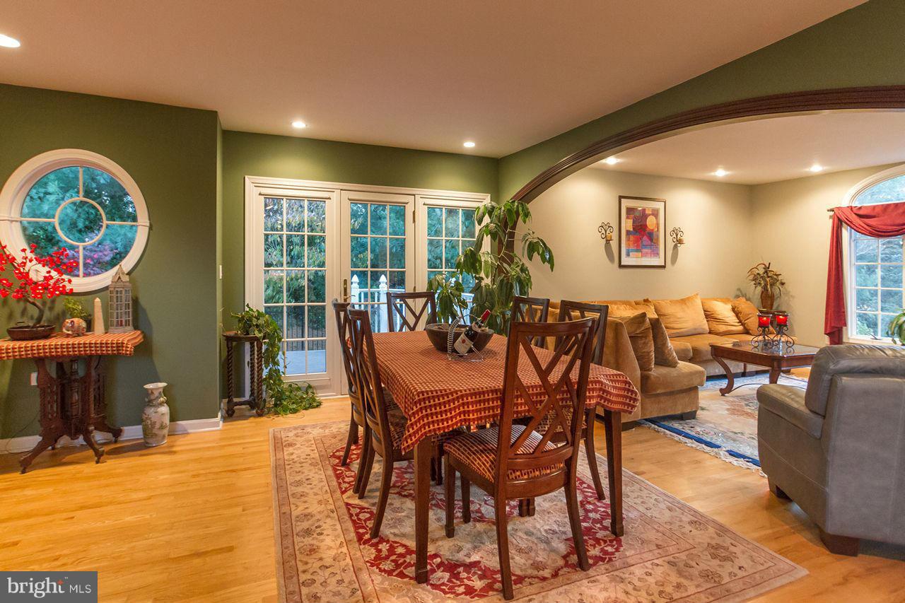 2223 Corbett Road Monkton, MD 21111 - Photo 13 of 30 a view of a dining room with furniture one side and wooden floor