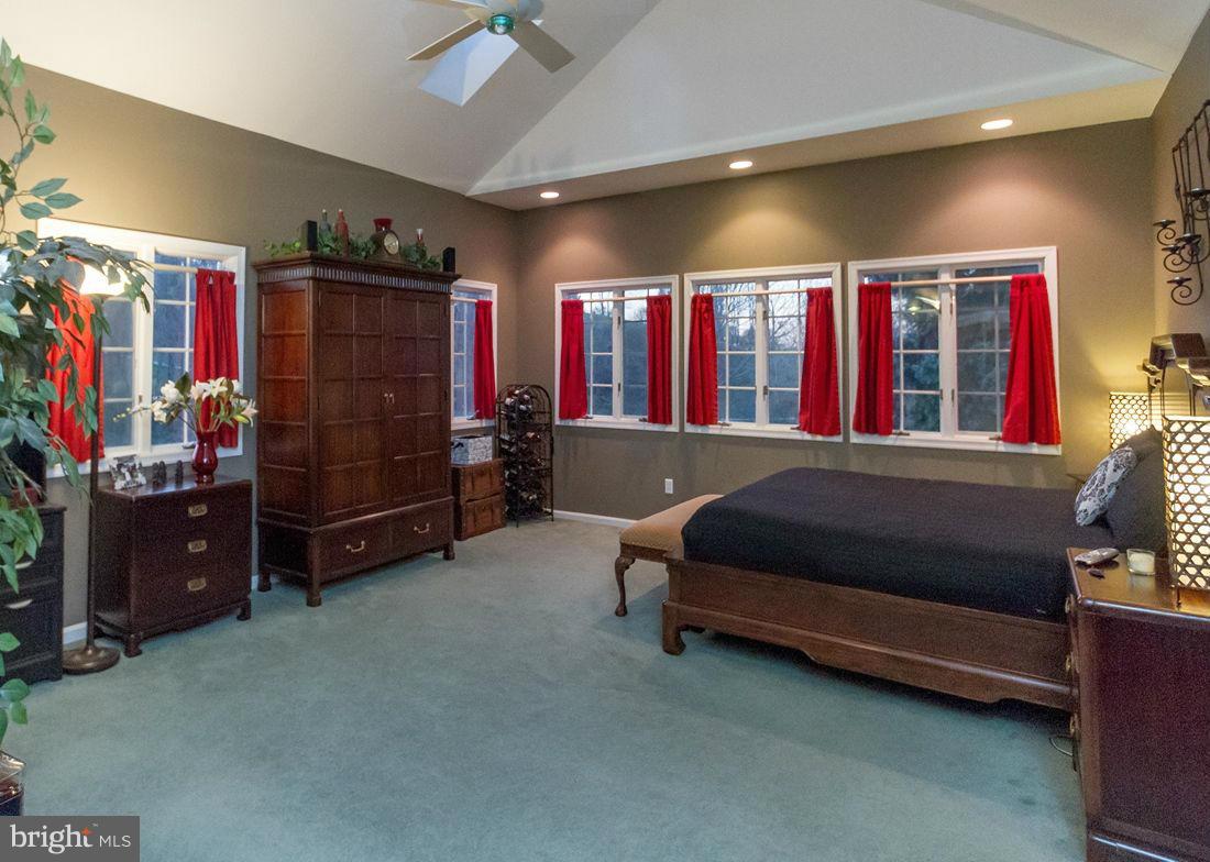 2223 Corbett Road Monkton, MD 21111 - Photo 16 of 30 a bed room with a bed and a chair