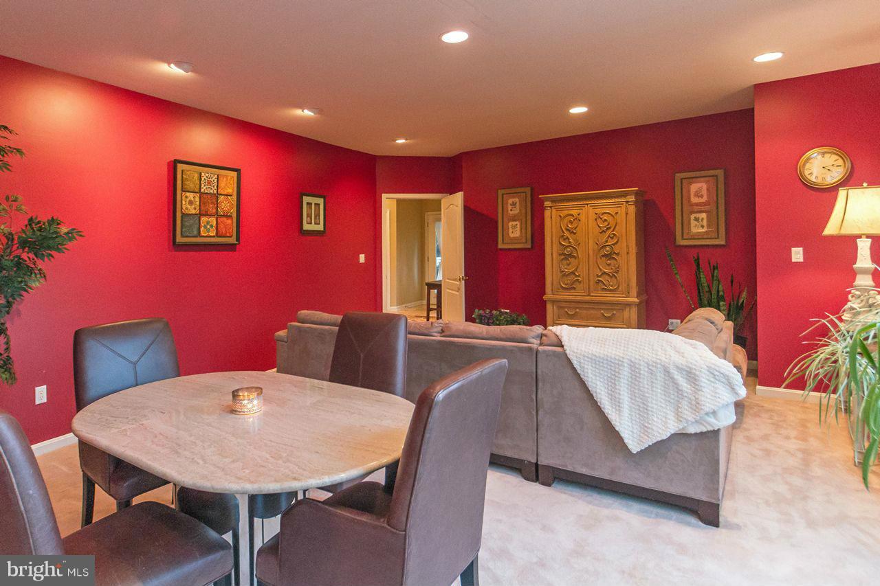 2223 Corbett Road Monkton, MD 21111 - Photo 19 of 30 a bed room with a bed and a table