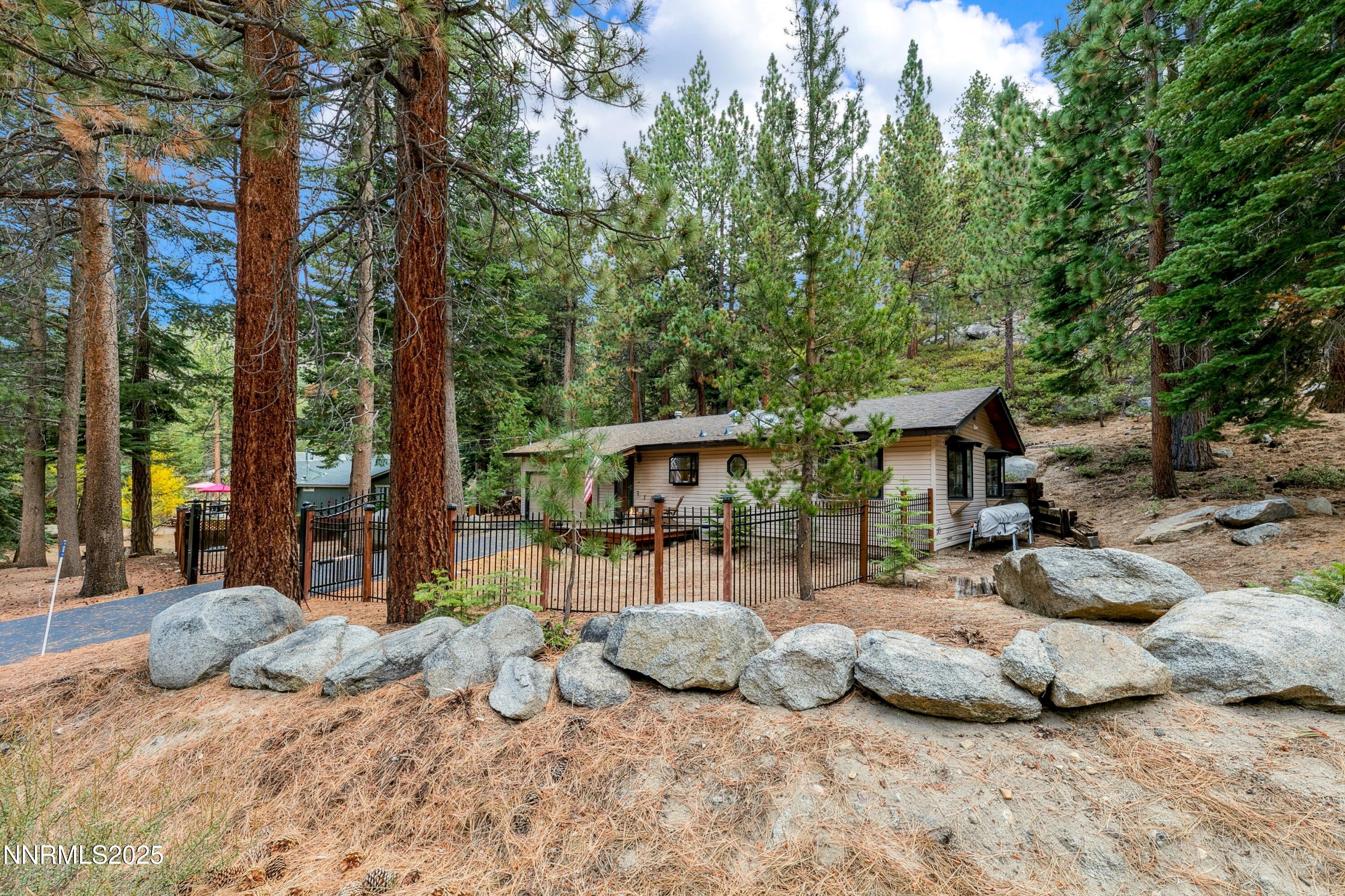 134 Aspen Way Stateline, NV 89449 - Photo 18 of 25 a view of a two chairs in the patio