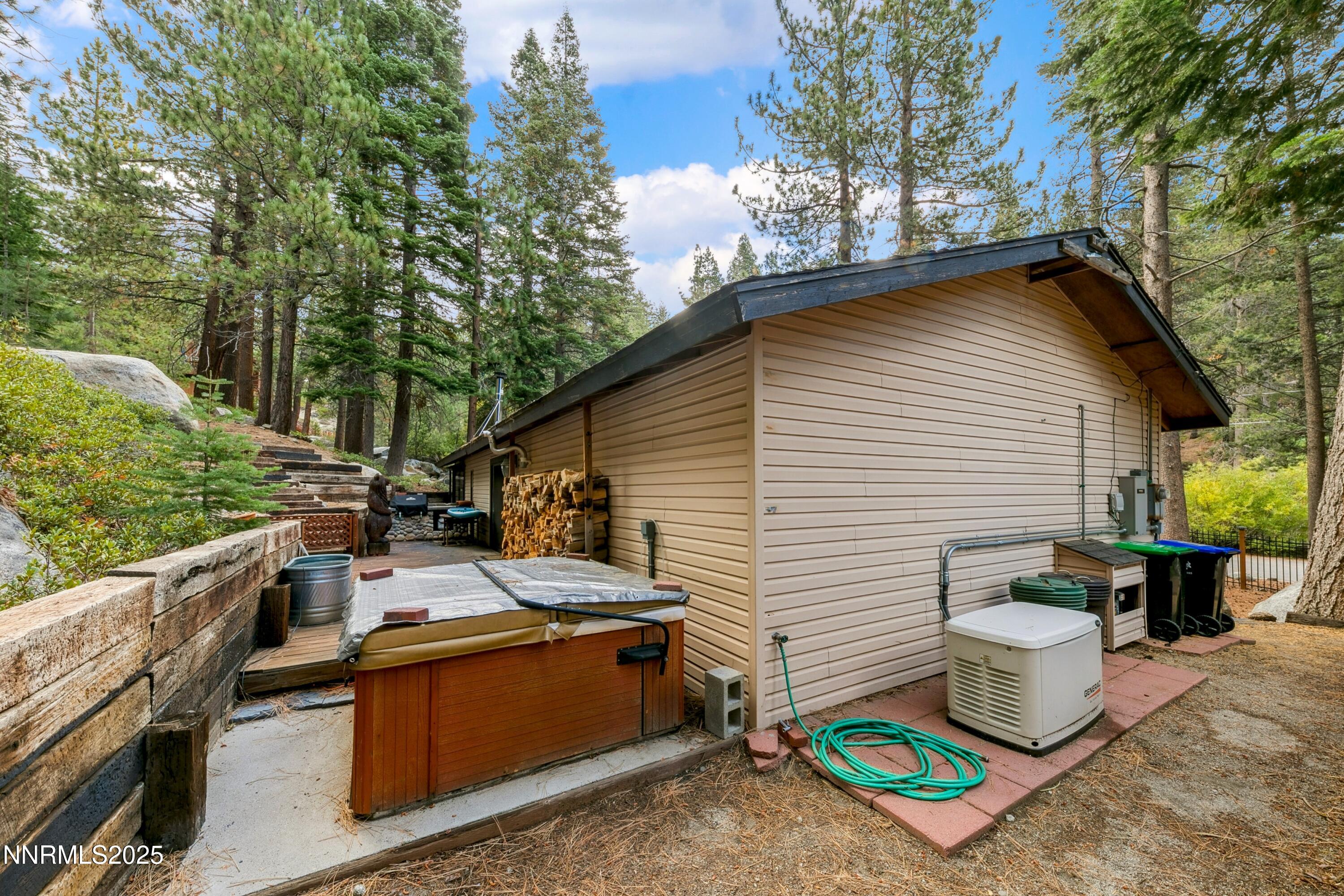 134 Aspen Way Stateline, NV 89449 - Photo 24 of 25 a backyard of a house with seating space