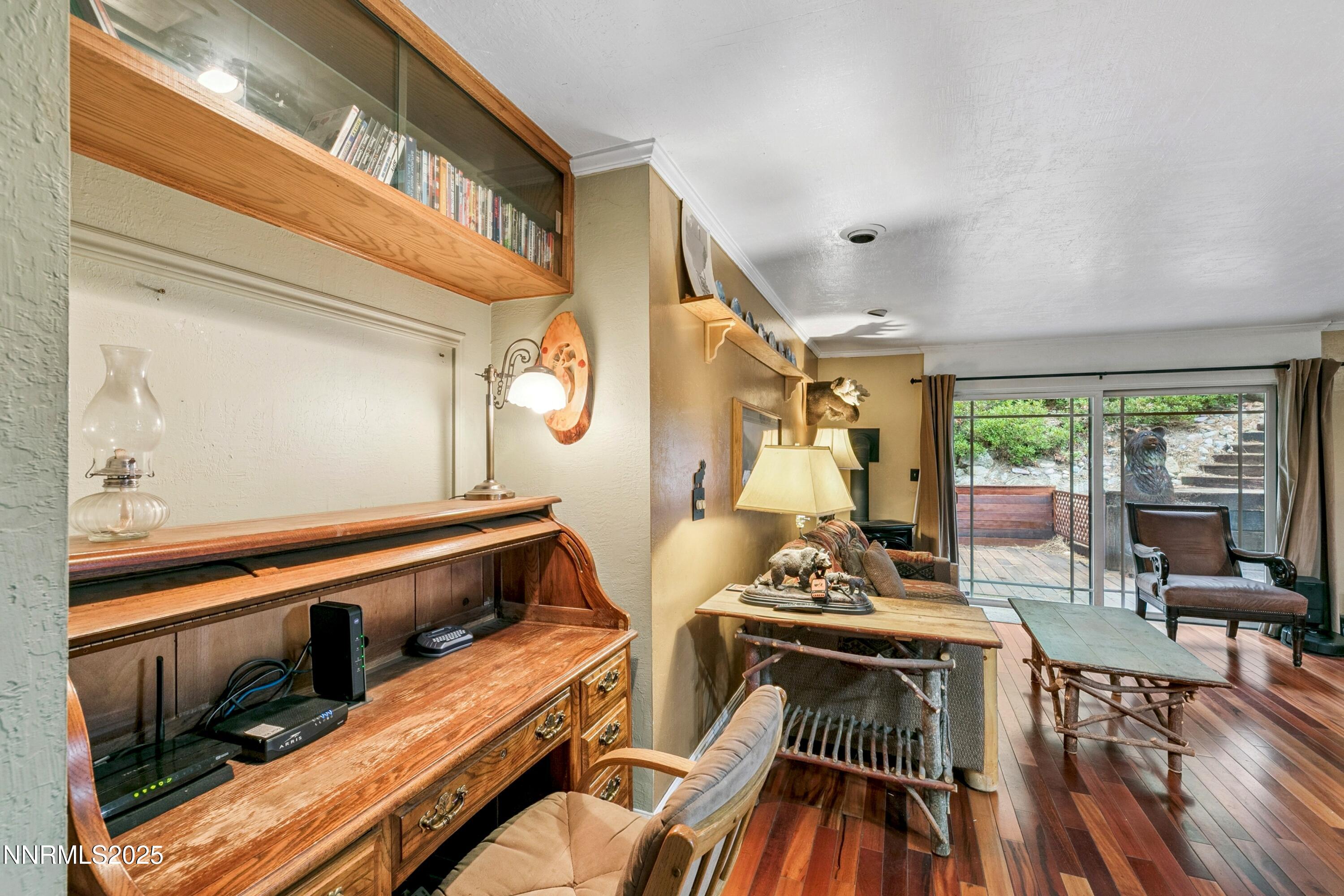 134 Aspen Way Stateline, NV 89449 - Photo 9 of 25 a view of a room with wooden floor and furniture
