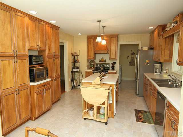 511 Mason Road Durham, NC 27712 - Photo 7 of 25 This cozy breakfast room is open to the kitchen and leads out to a covered deck area Breakfast Area