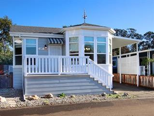front view of a house with a small yard