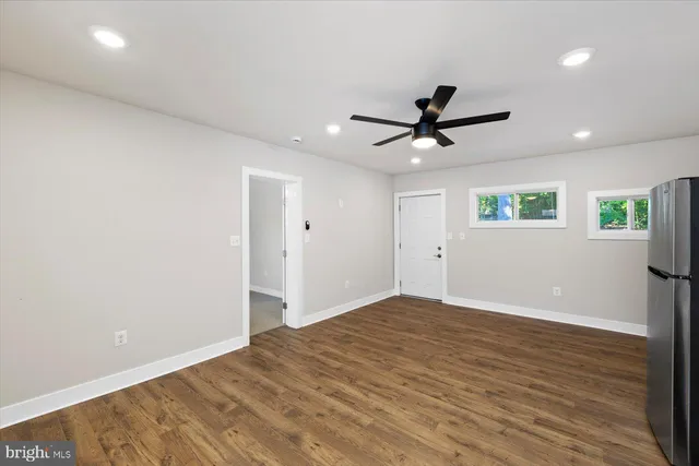 a view of an empty room and window