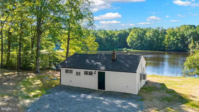 a view of a lake with a yard