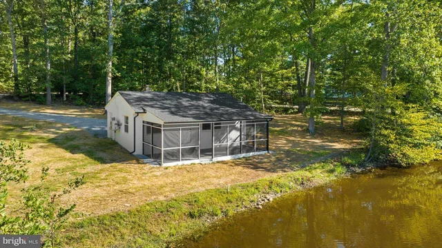 a swimming pool with trees in the background