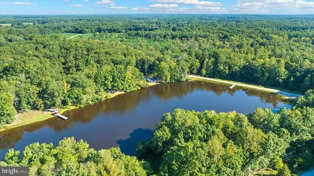 a view of a lake with a yard