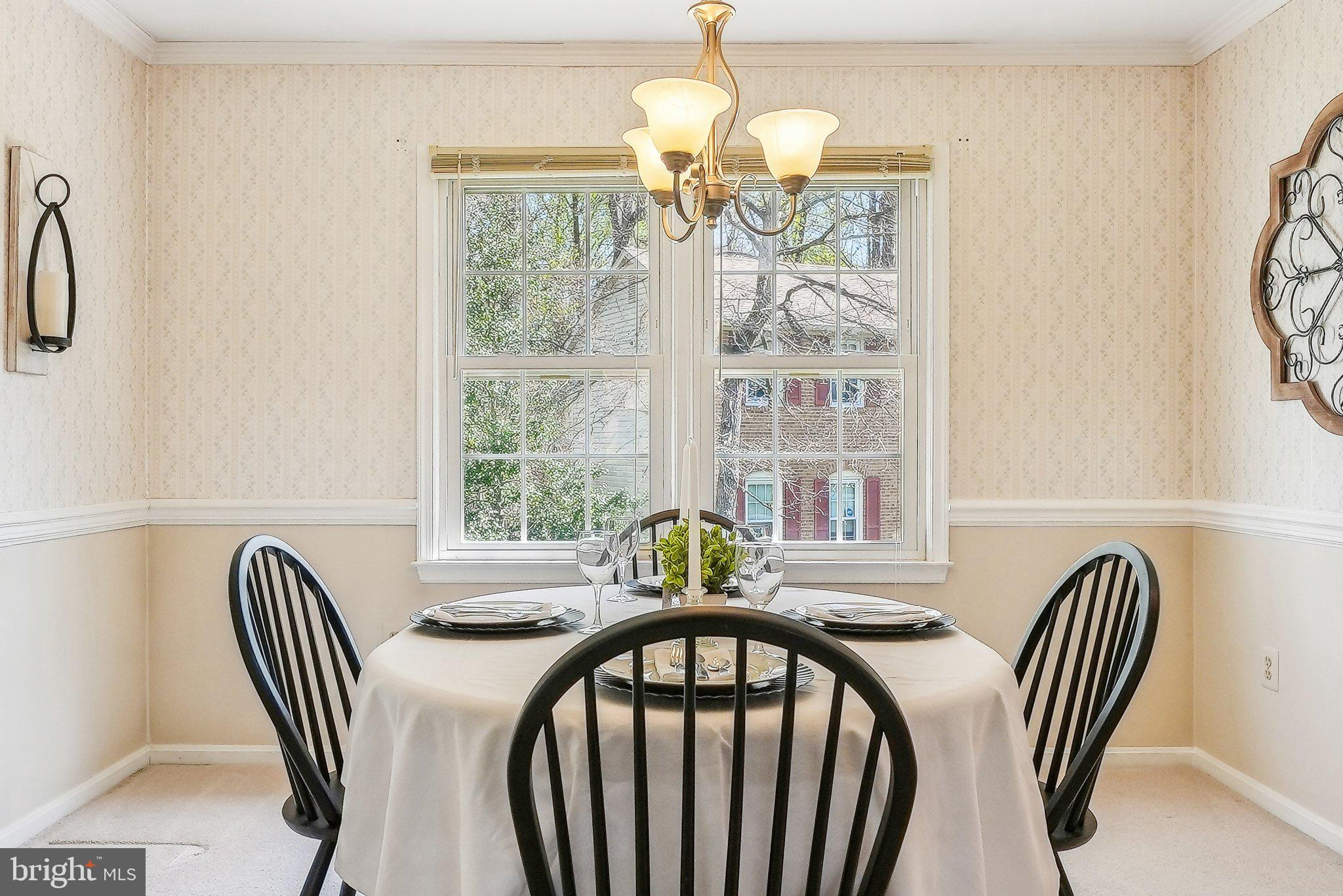 8312 Timber Brook Lane Springfield, VA 22153 - Photo 12 of 42 a view of a dining room with furniture window and outside view