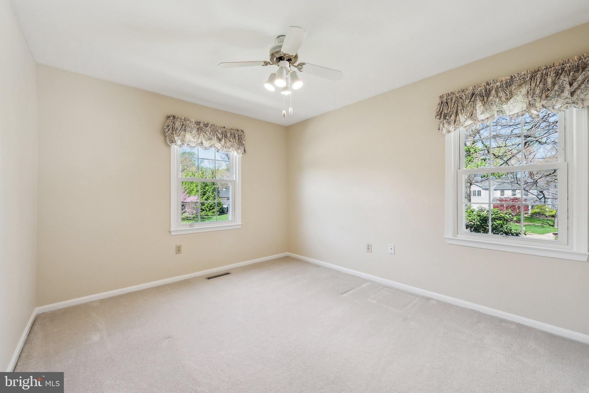 8312 Timber Brook Lane Springfield, VA 22153 - Photo 29 of 42 a view of an empty room with a window