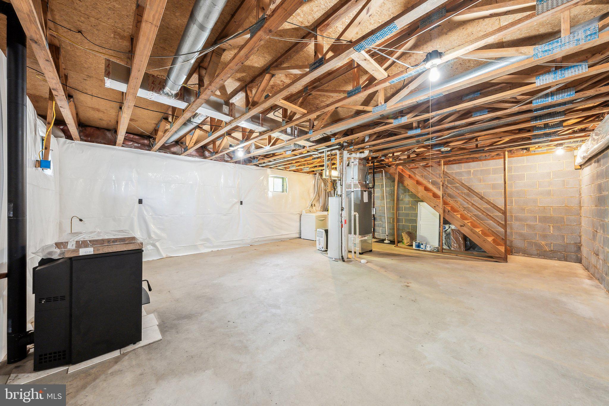 8312 Timber Brook Lane Springfield, VA 22153 - Photo 32 of 42 a view of an empty room with stairs