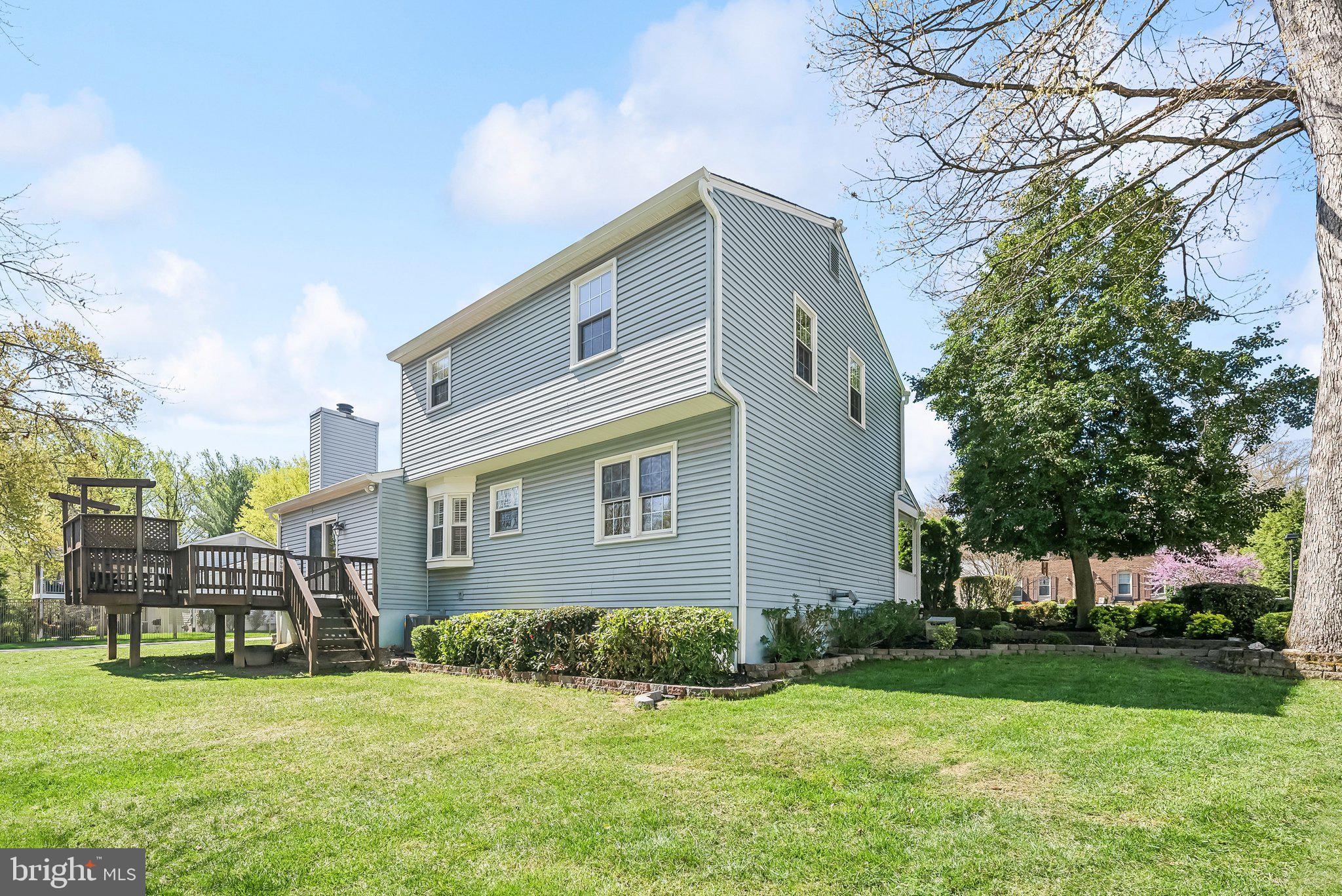 8312 Timber Brook Lane Springfield, VA 22153 - Photo 34 of 42 a front view of house with yard and green space