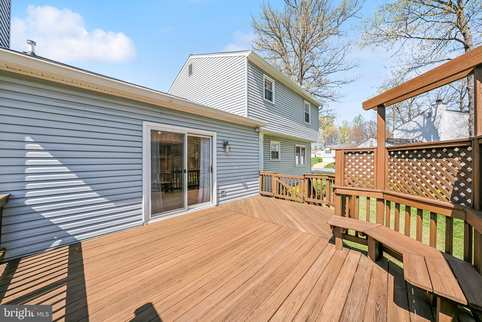 8312 Timber Brook Lane Springfield, VA 22153 - Photo 37 of 42 a view of a house with backyard and deck