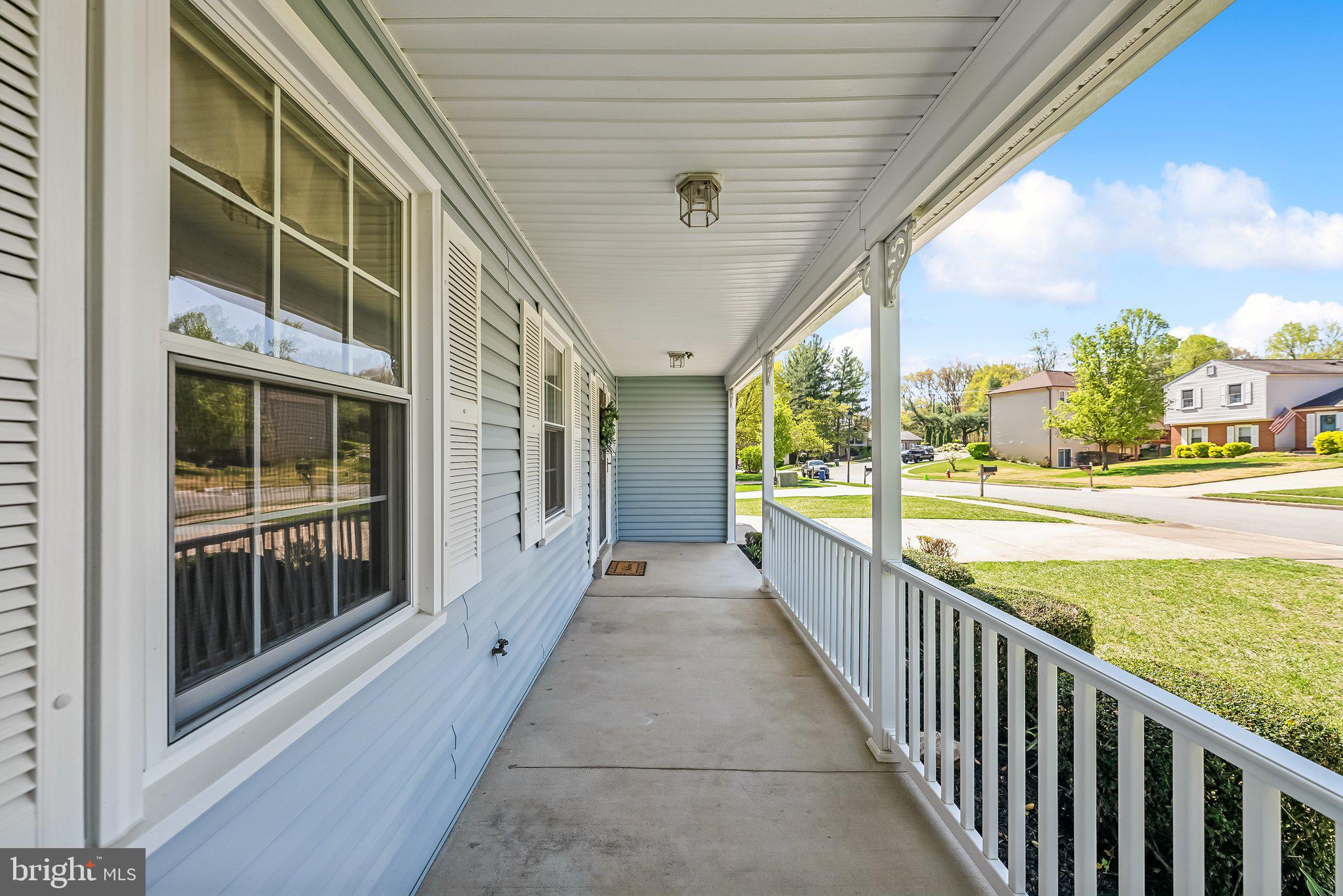 8312 Timber Brook Lane Springfield, VA 22153 - Photo 5 of 42 a view of a building from a balcony