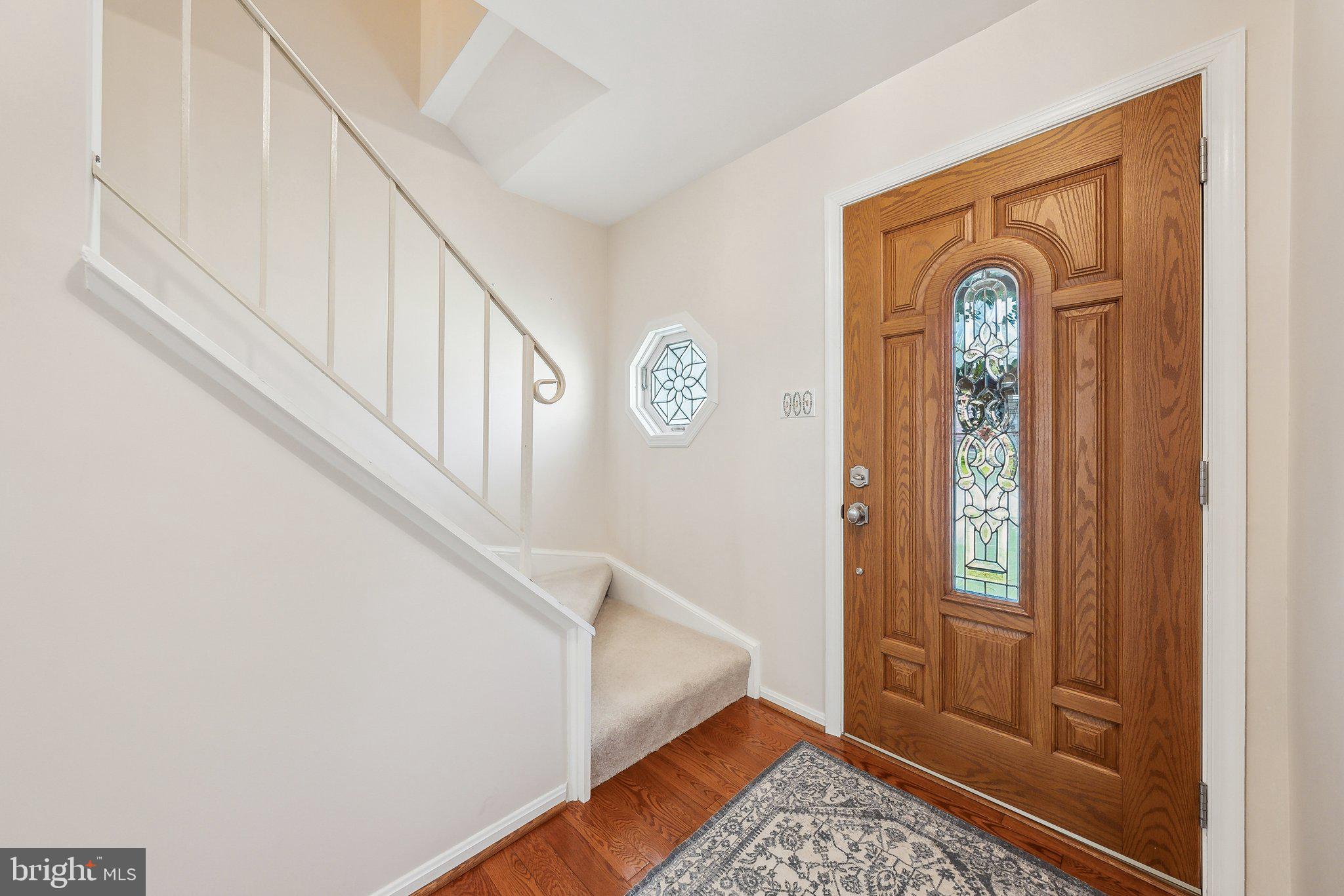 8312 Timber Brook Lane Springfield, VA 22153 - Photo 6 of 42 a view of an entryway with a front door