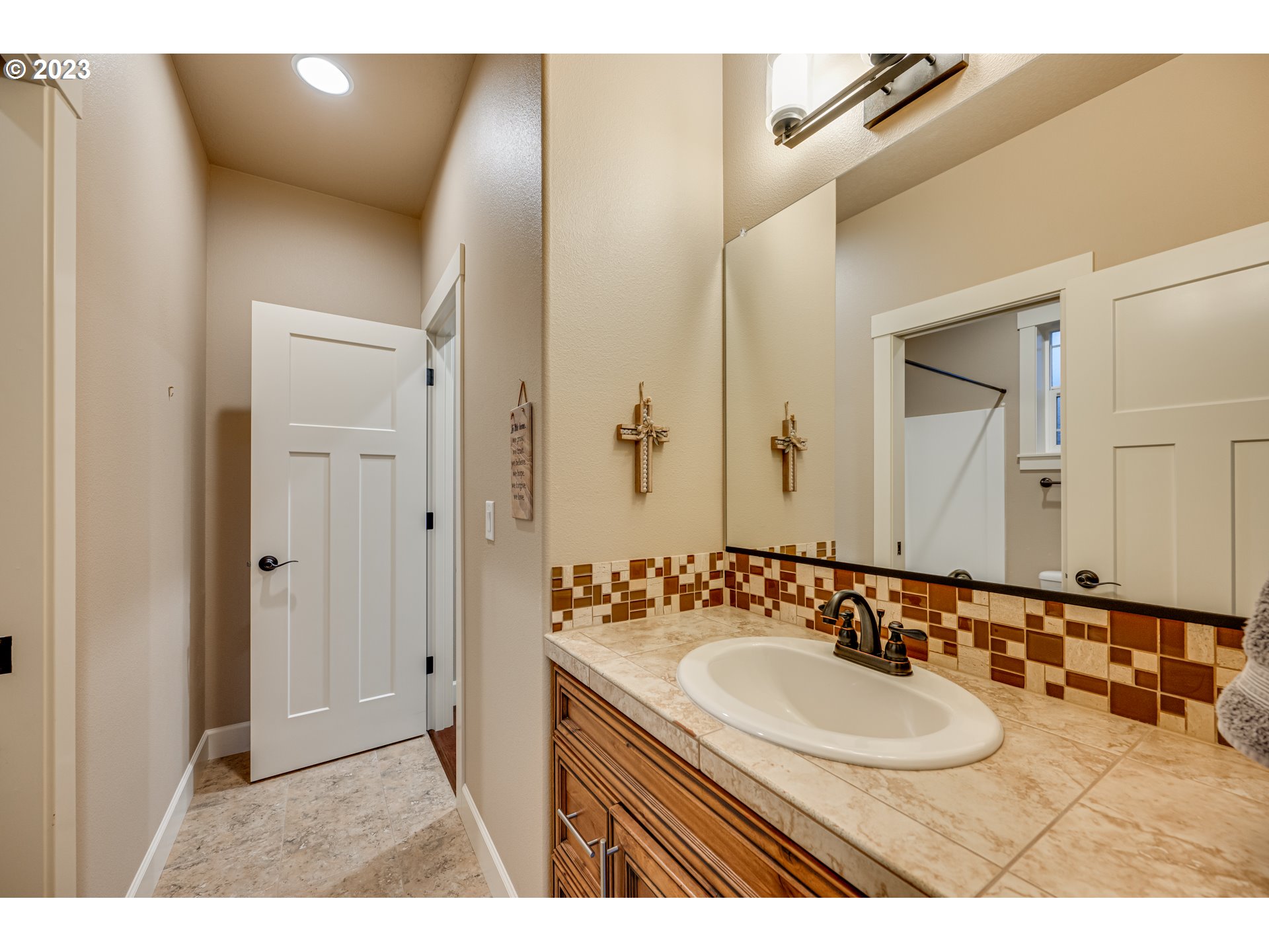 1730 South 14th Court Ridgefield, WA 98642 - Photo 23 of 32 a bathroom with a sink and a mirror