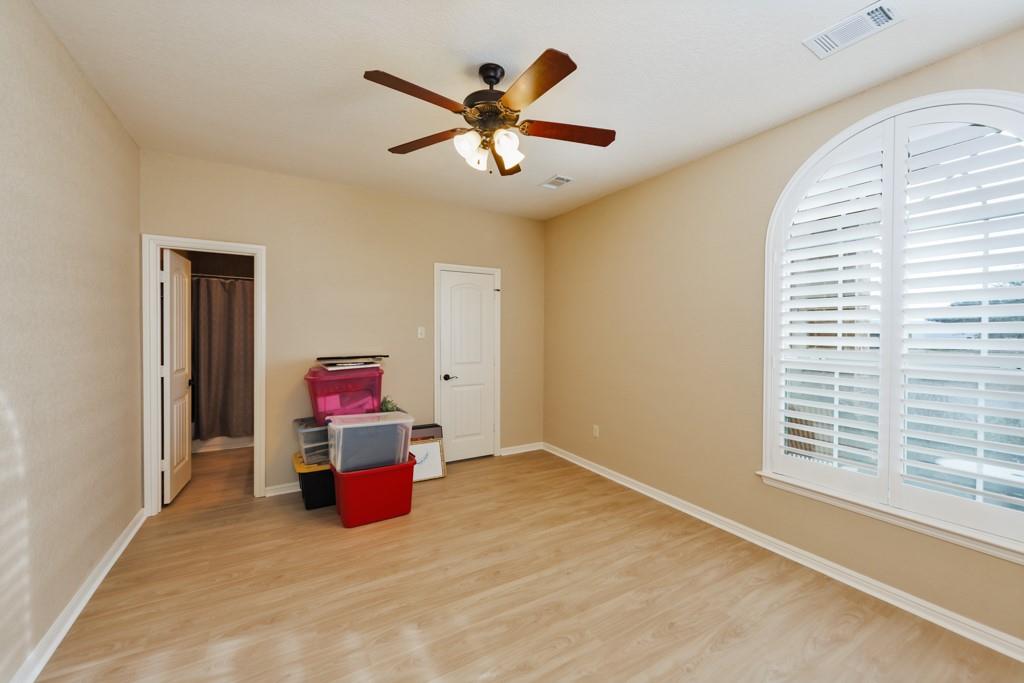 151 Conestoga Court Rhome, TX 76078 - Photo 12 of 38 a living room with furniture and window