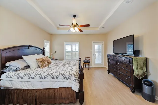 a bedroom with a bed and furniture