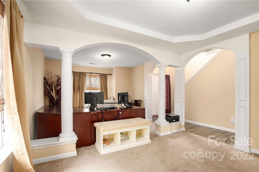 1222 Ben Livingston Road Charlotte, NC 28214 - Photo 6 of 32 a living room with furniture and a table