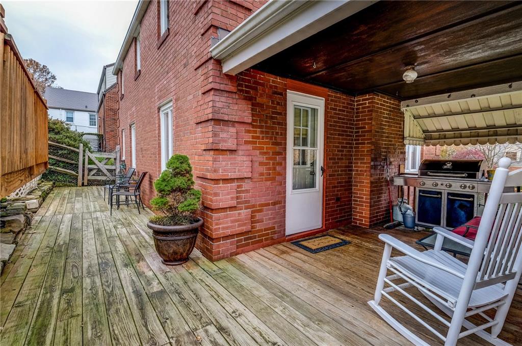 24 Leon Road Pittsburgh, PA 15220 - Photo 17 of 24 Deck was extended and now runs along the entire rear of the home