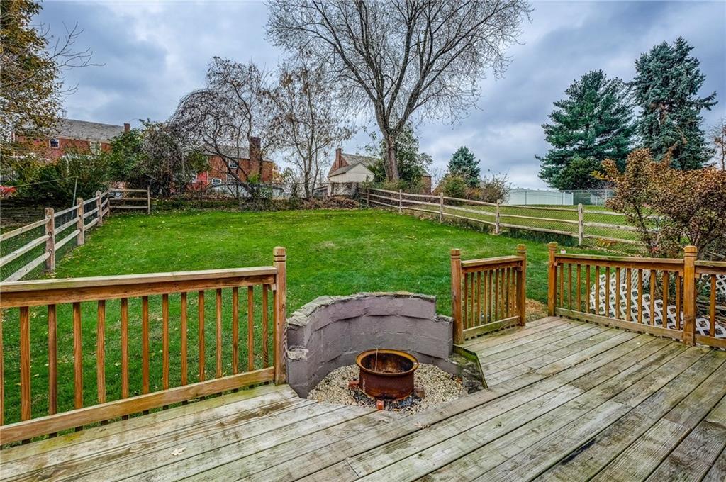 24 Leon Road Pittsburgh, PA 15220 - Photo 19 of 24 Upper Level Deck looks out at the fenced in backyard