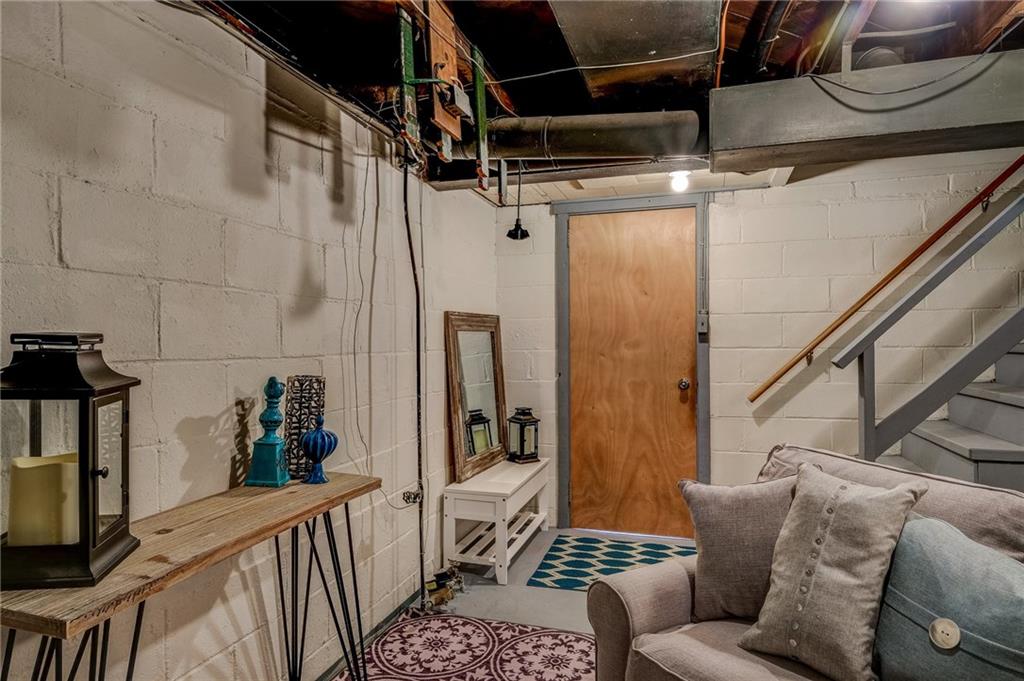 24 Leon Road Pittsburgh, PA 15220 - Photo 22 of 24 Unfinished Basement has for a TV/Game room plus space for a Bench coming in from the garage.