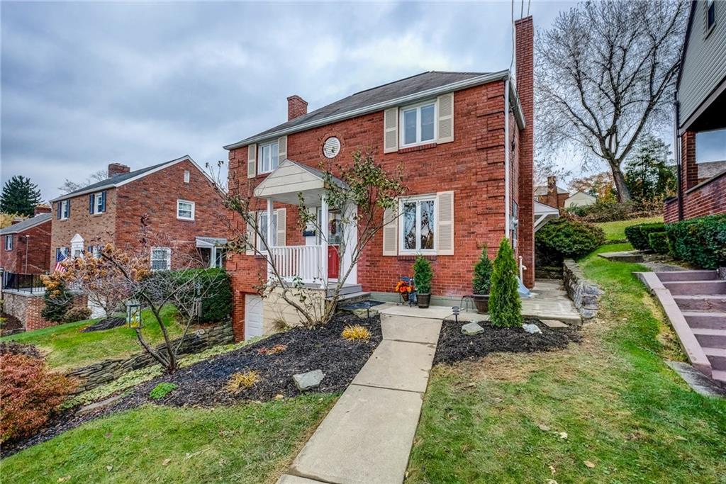 24 Leon Road Pittsburgh, PA 15220 - Photo 24 of 24 Concrete walkway from the front stoop extends around the side of the home to the rear decks