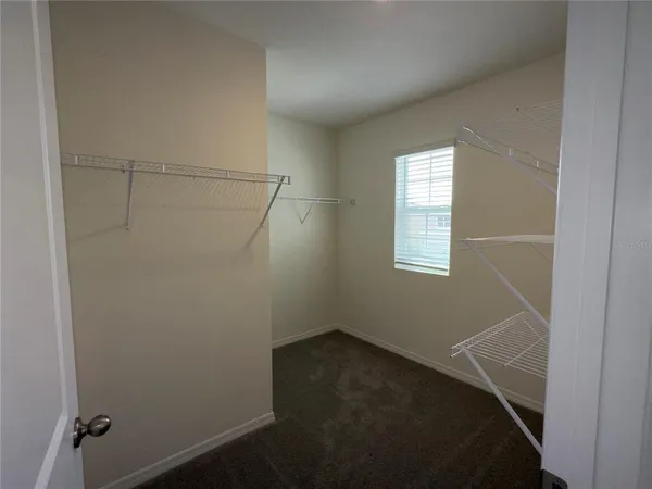 a view of small space with racks on the wall
