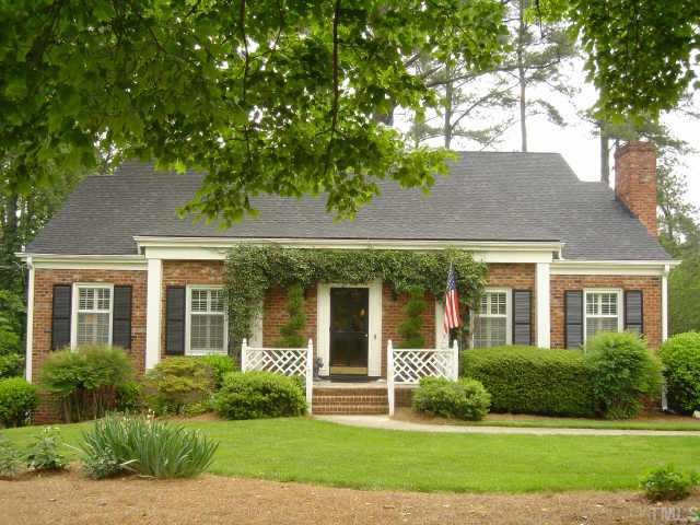 2316 Ridge Road Raleigh, NC 27612 - Photo 1 of 1 a front view of a house with a yard