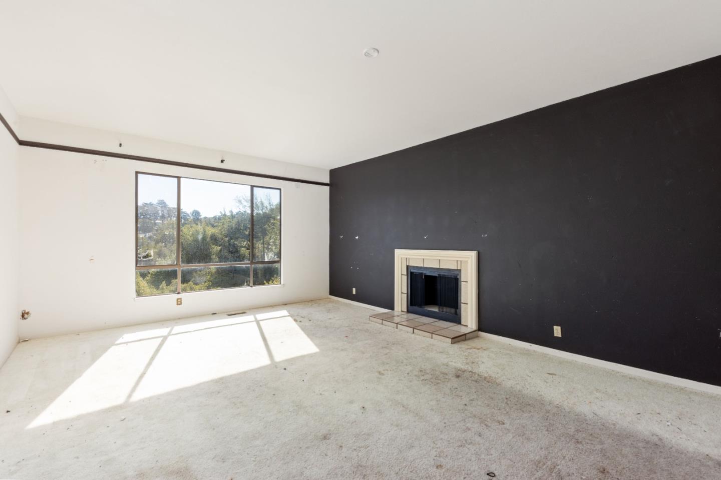 20 Pine Court Hillsborough, CA 94010 - Photo 4 of 14 a view of an empty room with a window