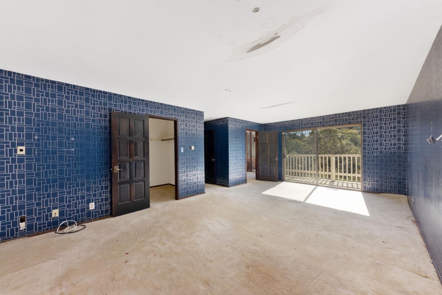 20 Pine Court Hillsborough, CA 94010 - Photo 6 of 14 a view of an empty room with a balcony